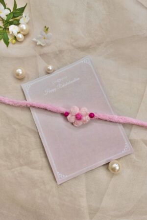 Gentle crochet Rakhi for babies